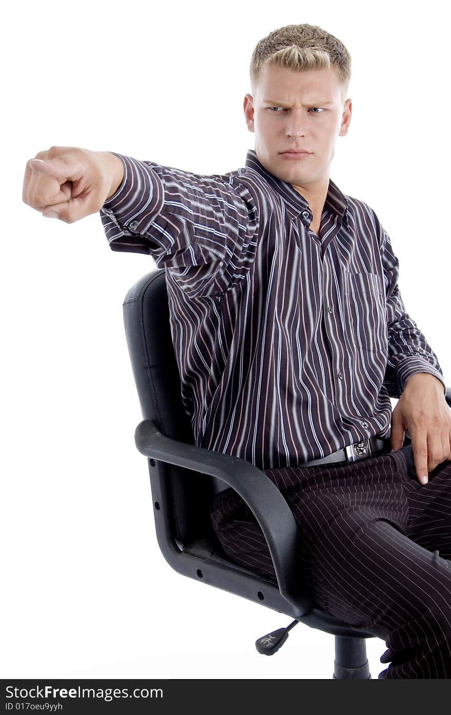 Young american pointing angrily on an isolated white background