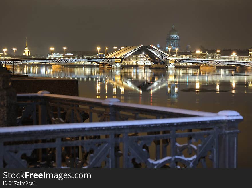 Bridges raise in the summer when navigation is opened. Here the road cloth of the bridge is covered by snow. St.-Petersburg, Russia. Bridges raise in the summer when navigation is opened. Here the road cloth of the bridge is covered by snow. St.-Petersburg, Russia.