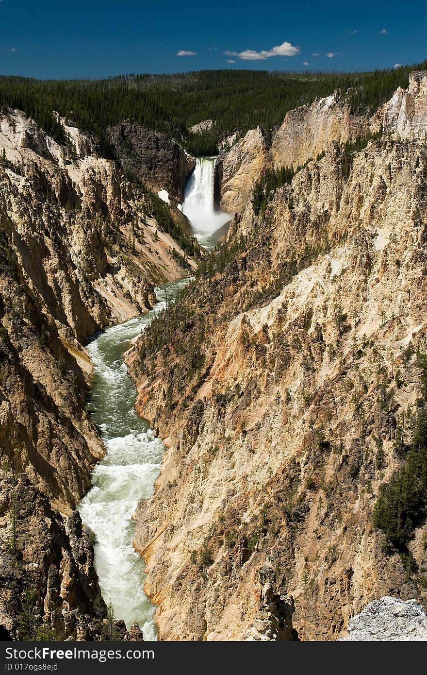 Big waterfall in between canyons in yellostone usa. Big waterfall in between canyons in yellostone usa