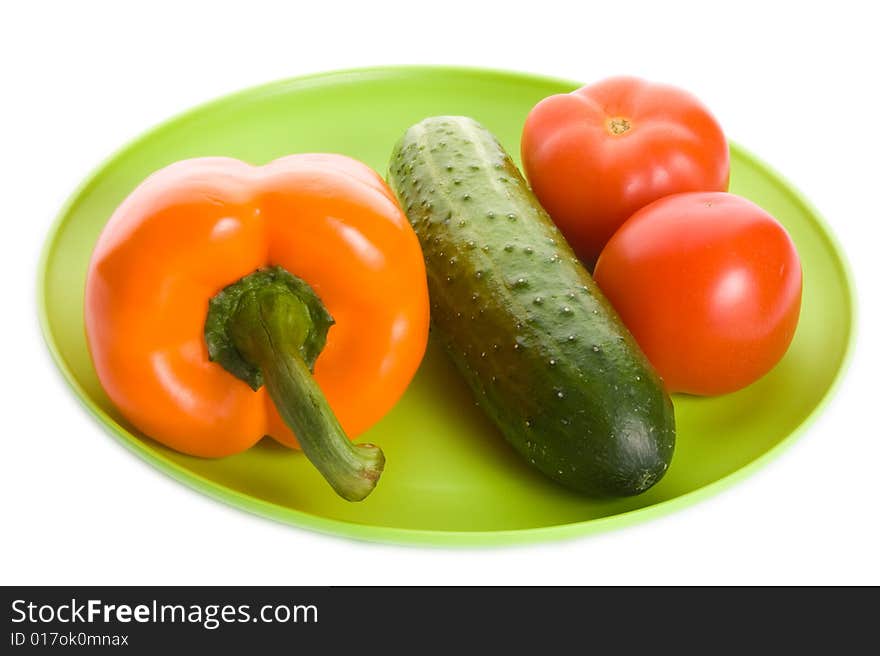 Few fruits on plate isolated on white