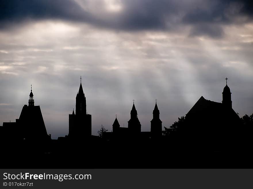 Silhouettes against skies.