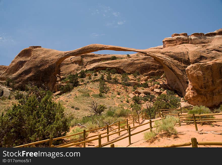 Rock arch on blue sky background in arches national park utah