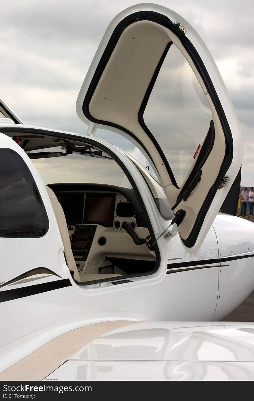 A partial view of cockpit of a executive jet, viwed by a open door. A partial view of cockpit of a executive jet, viwed by a open door