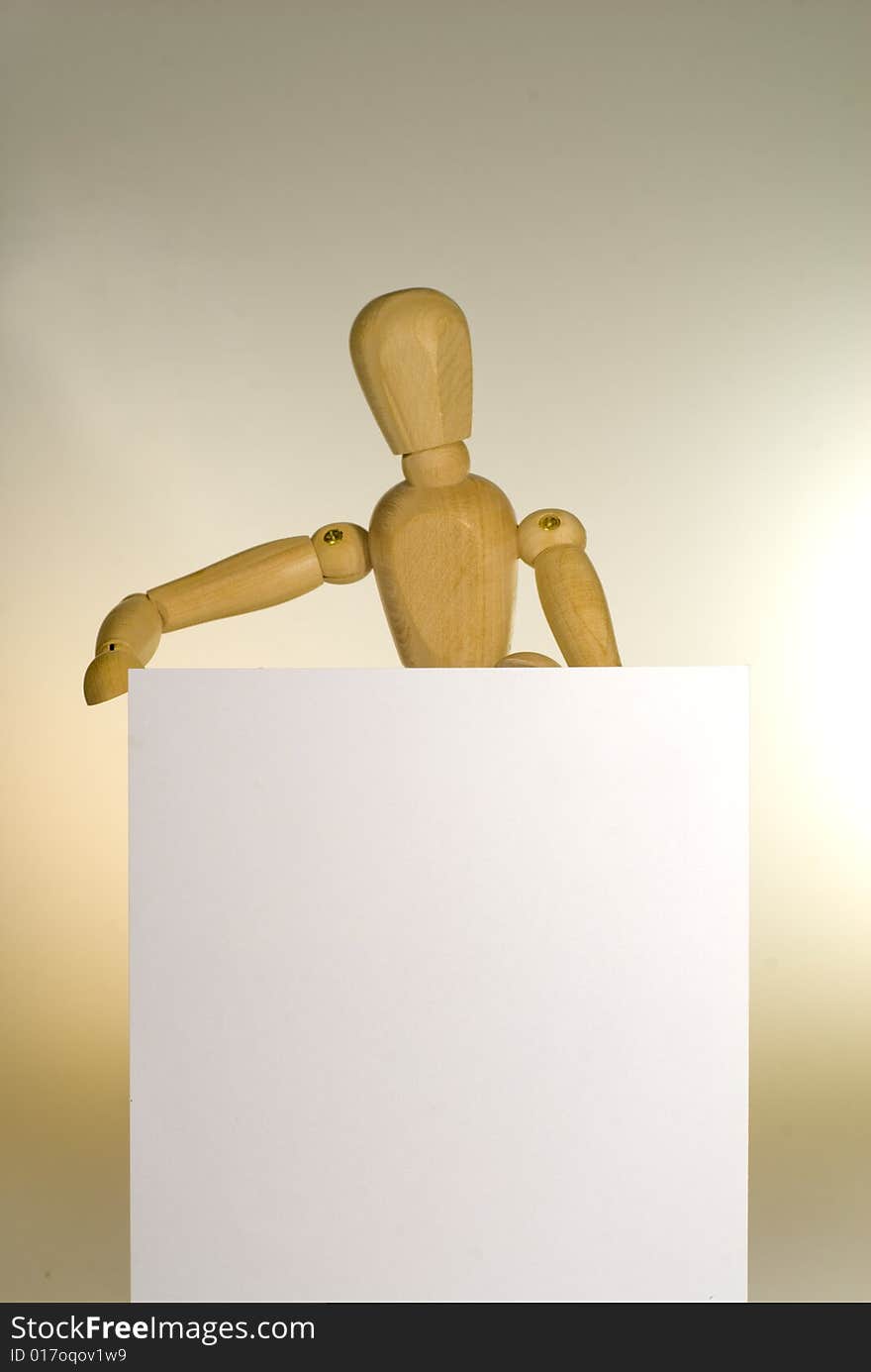 A shot of a jointed Doll showing a blank sign