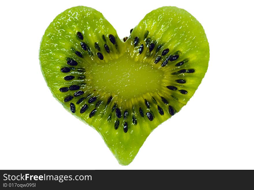 A shot of a kiwi slice in heart shape. A shot of a kiwi slice in heart shape