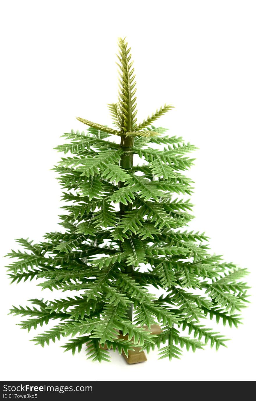 Plastic fur-tree on a white background isolated