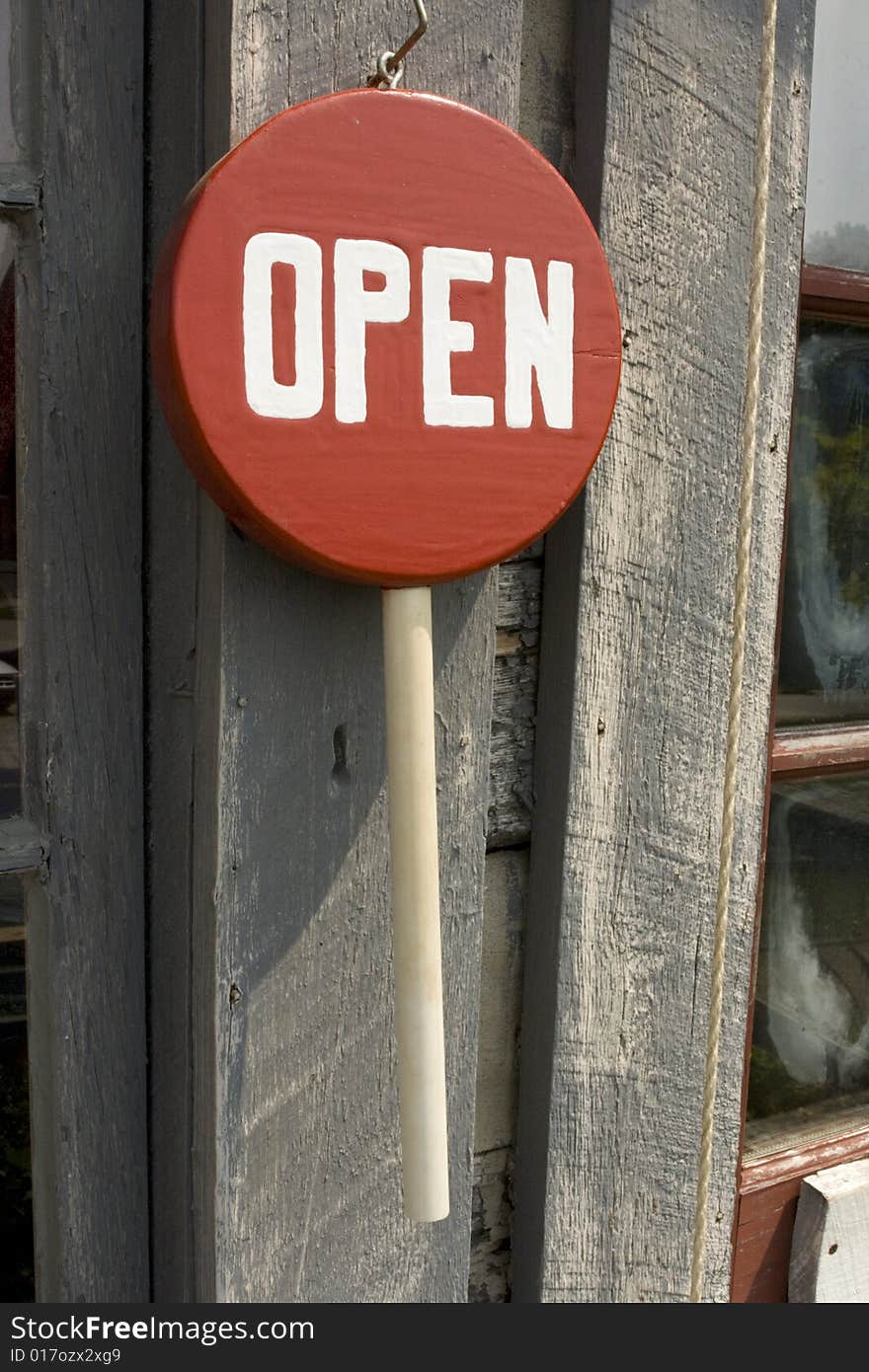 Store open sign on a candy cane form. Store open sign on a candy cane form.