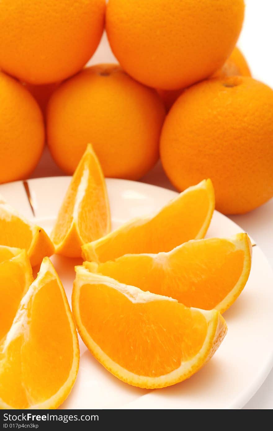 Orange pieces put together with fresh orange. Orange pieces put together with fresh orange.