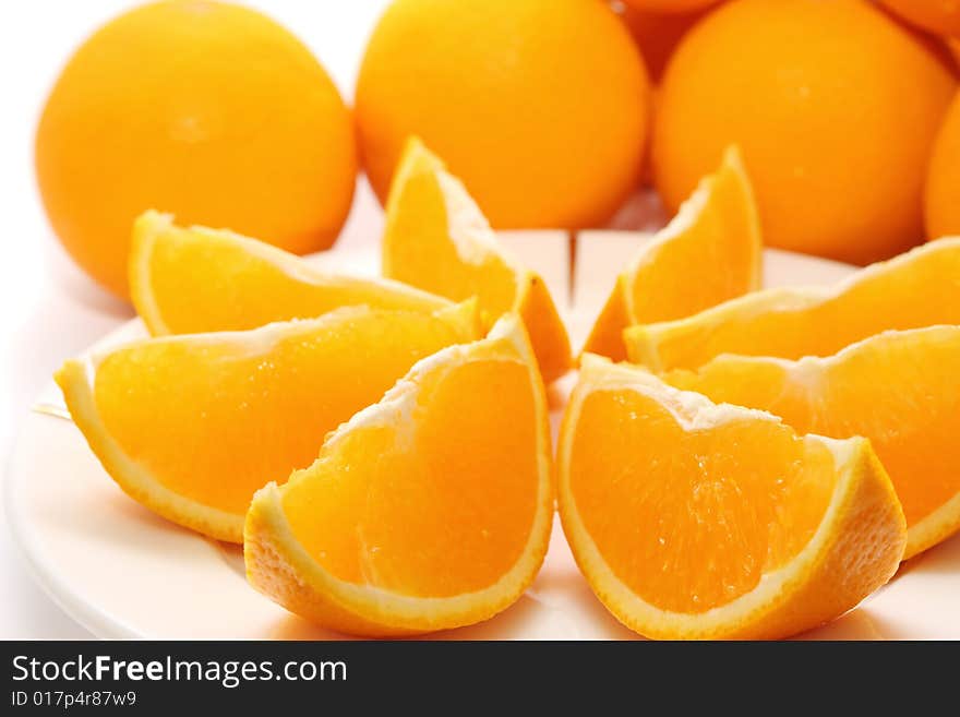 Orange pieces put together with fresh orange. Orange pieces put together with fresh orange.