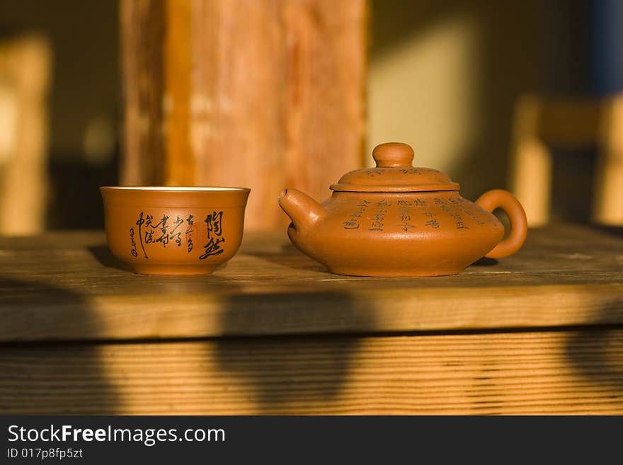 The ceramic pot with cup. The ceramic pot with cup