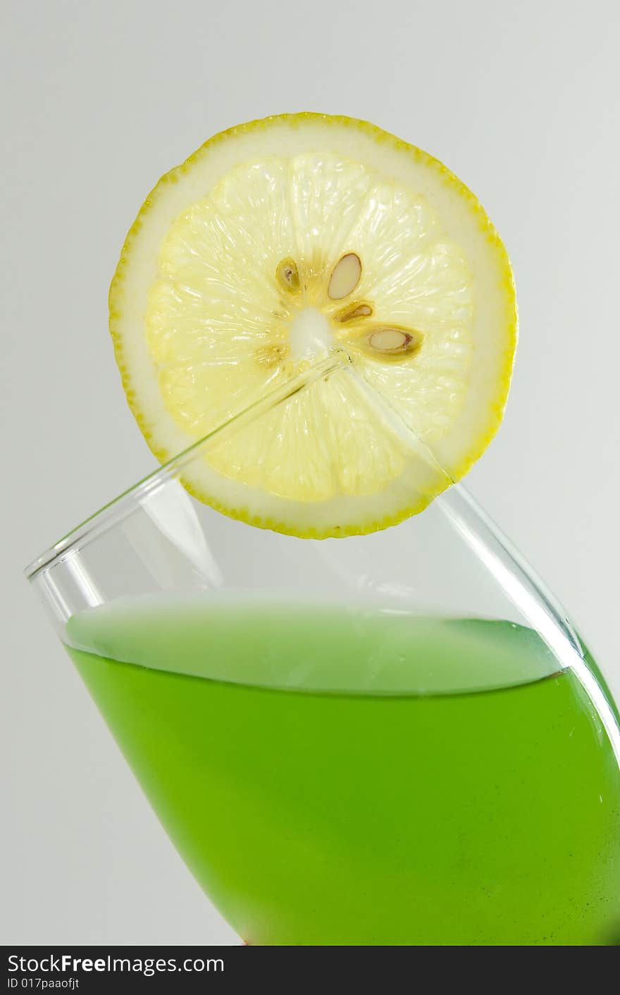 A Glass With A Lemon