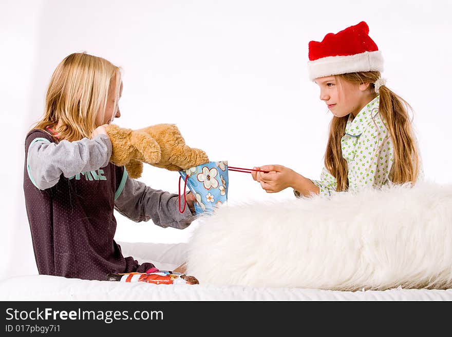 Two children having a fight about the present. Two children having a fight about the present