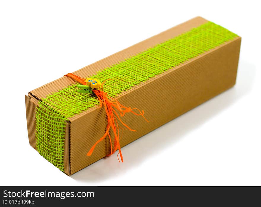 Cardboard gift box with colorful decoration on white background