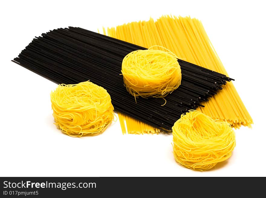 Different beautiful pasta on a white background