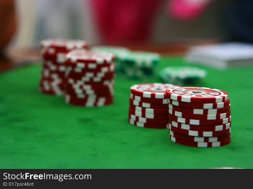 Poker table with chips lying on it. Poker table with chips lying on it