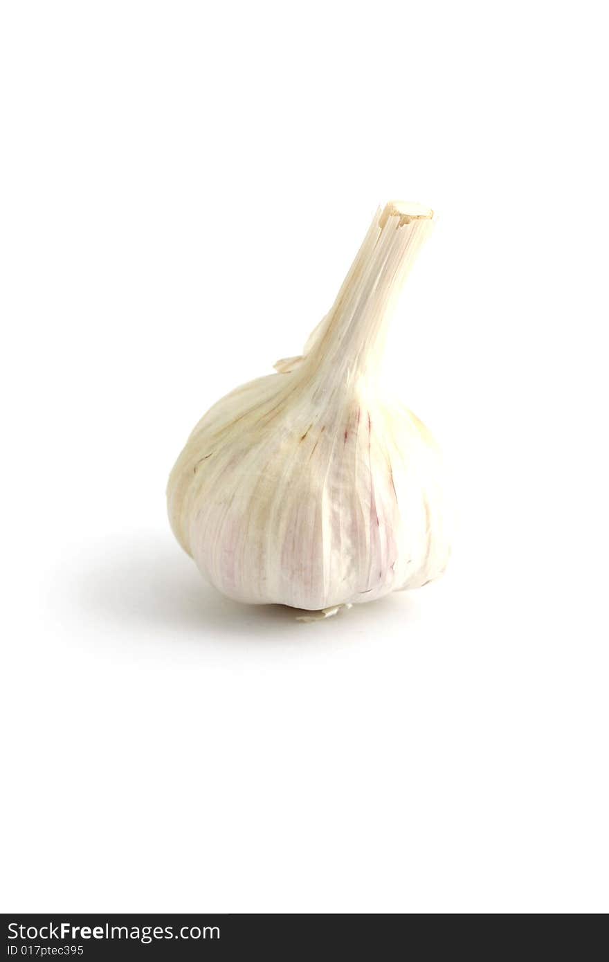 A garlic clove isolated on a white background