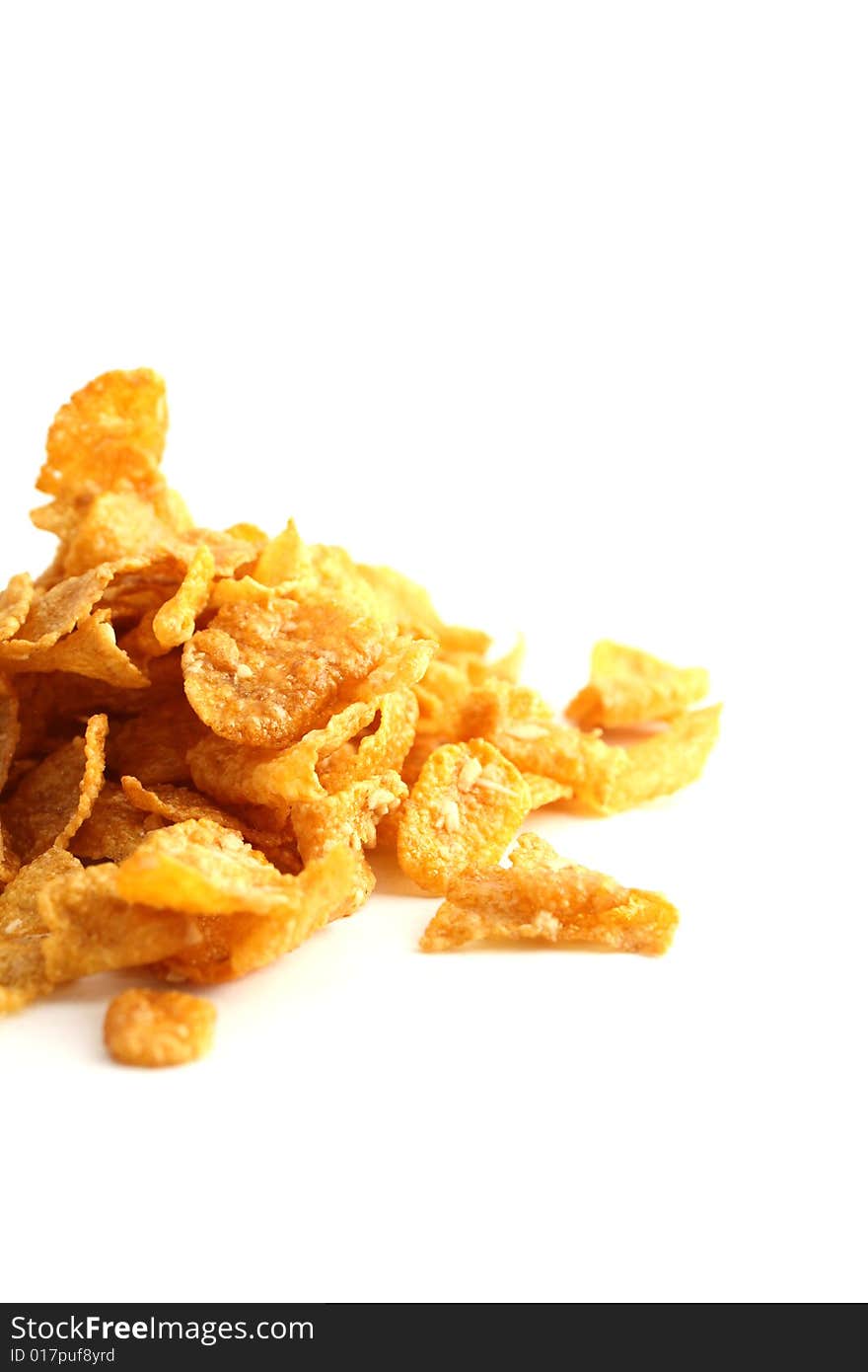 A heap on cornflakes isoltaed on a white background