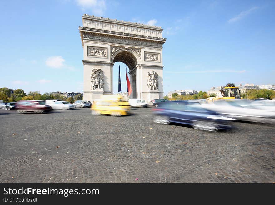 Moving traffic at the Arc de Triomphe, Paris, France