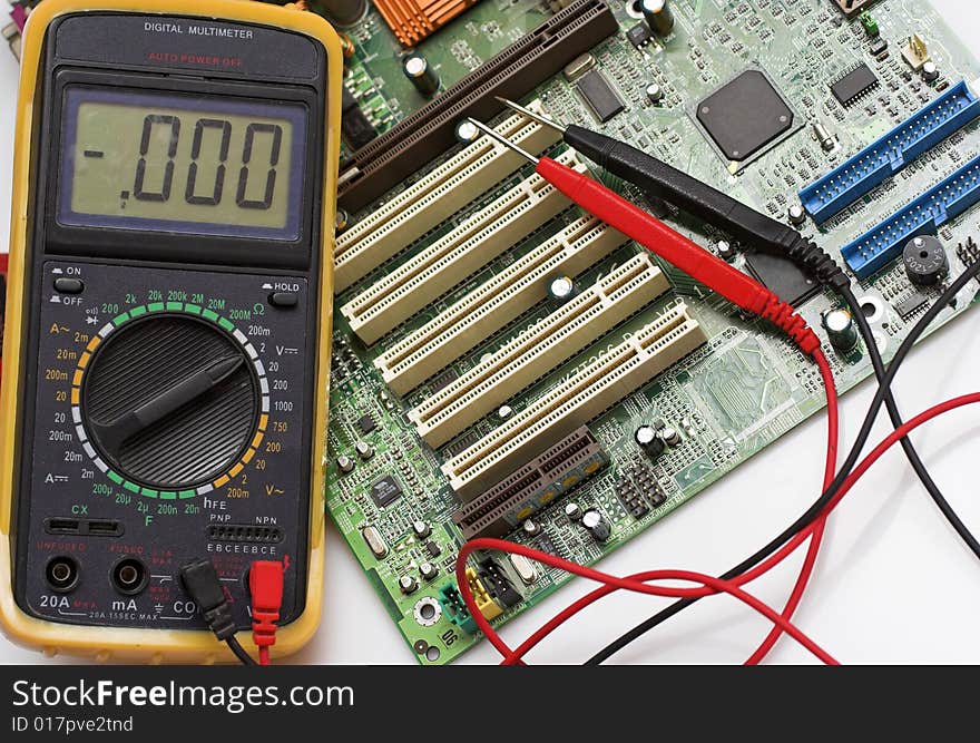 Memory Circuit Board Close Up with multimeter. Memory Circuit Board Close Up with multimeter