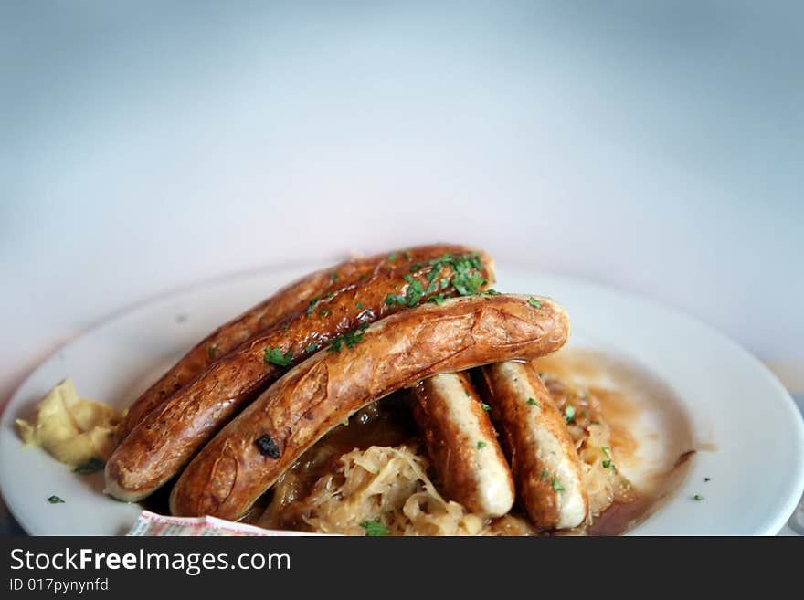A  plate with spicy  Bavarian sausages. A  plate with spicy  Bavarian sausages