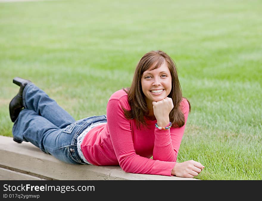 Pretty Girl in Pink Laying Down