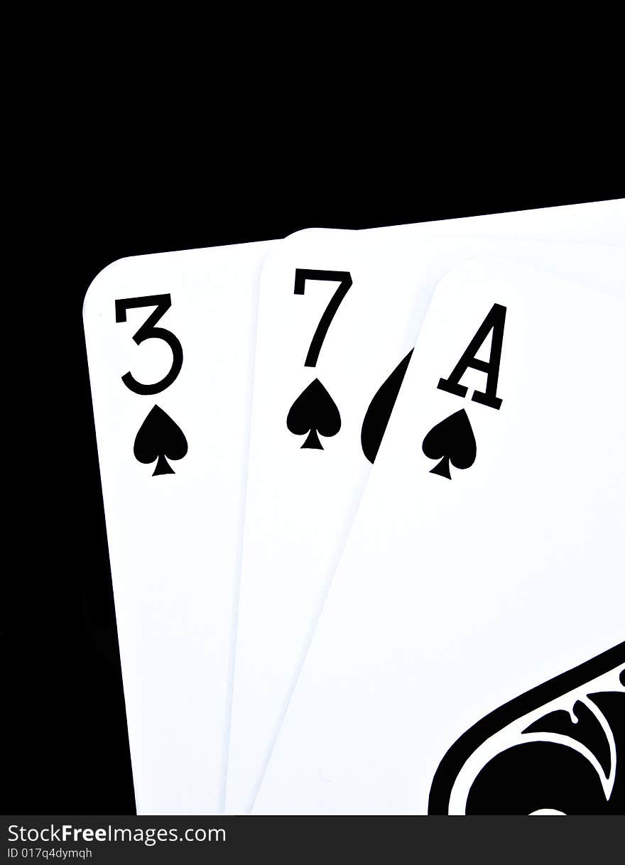 Playing cards on a black background