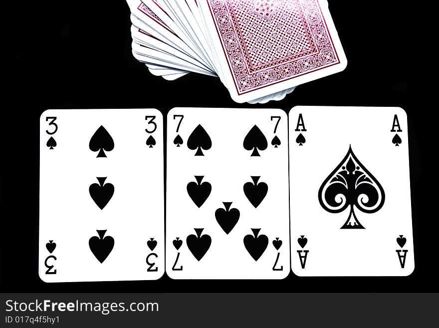 Playing cards on a black background