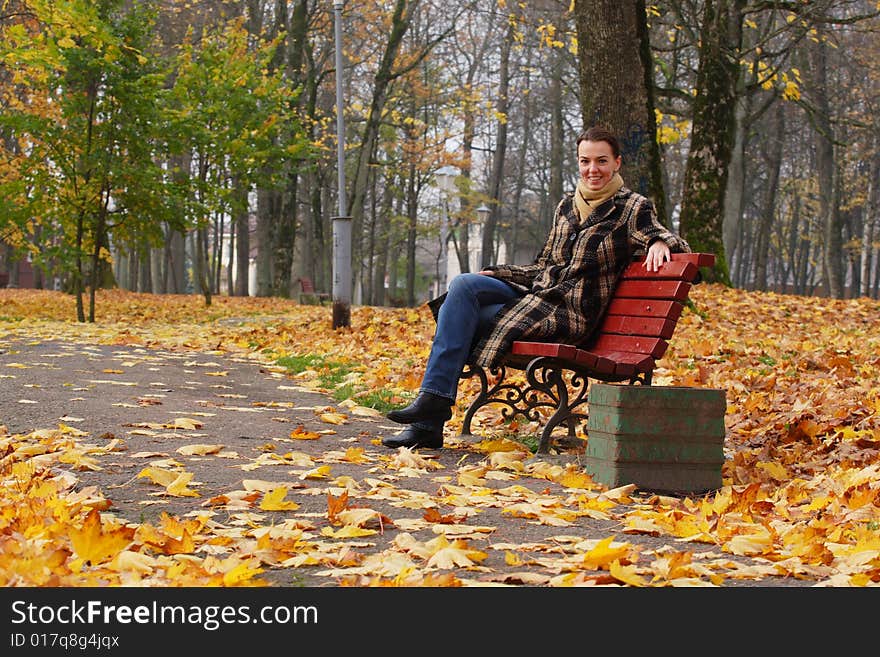 Young woman sitting on a bench