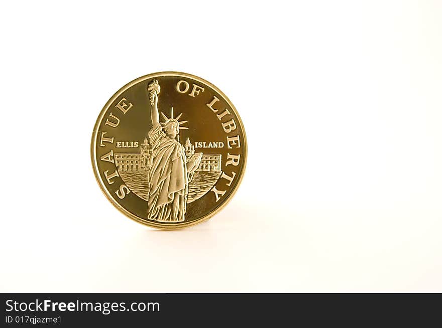 Golden plated coin witn Statue of Liberty. Golden plated coin witn Statue of Liberty