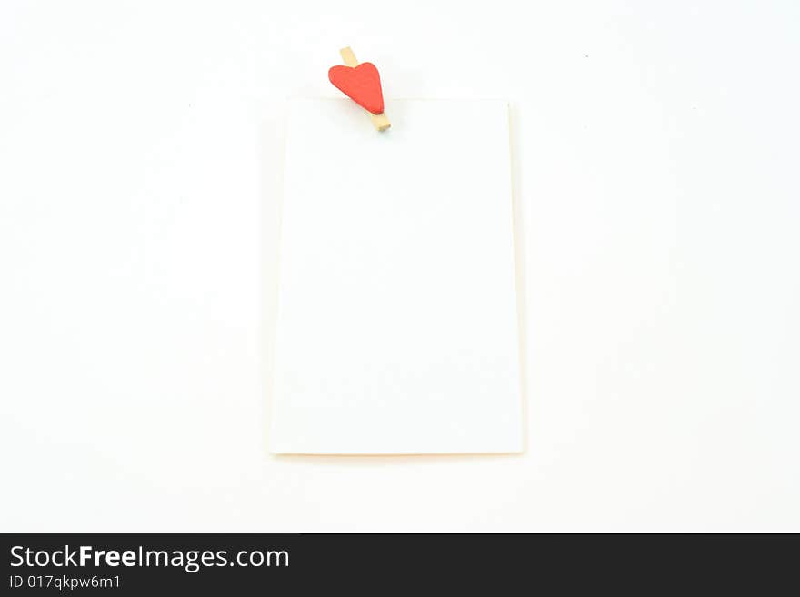 White card on a white background with heart