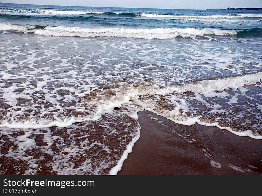 Waves breaking on the beach. Waves breaking on the beach