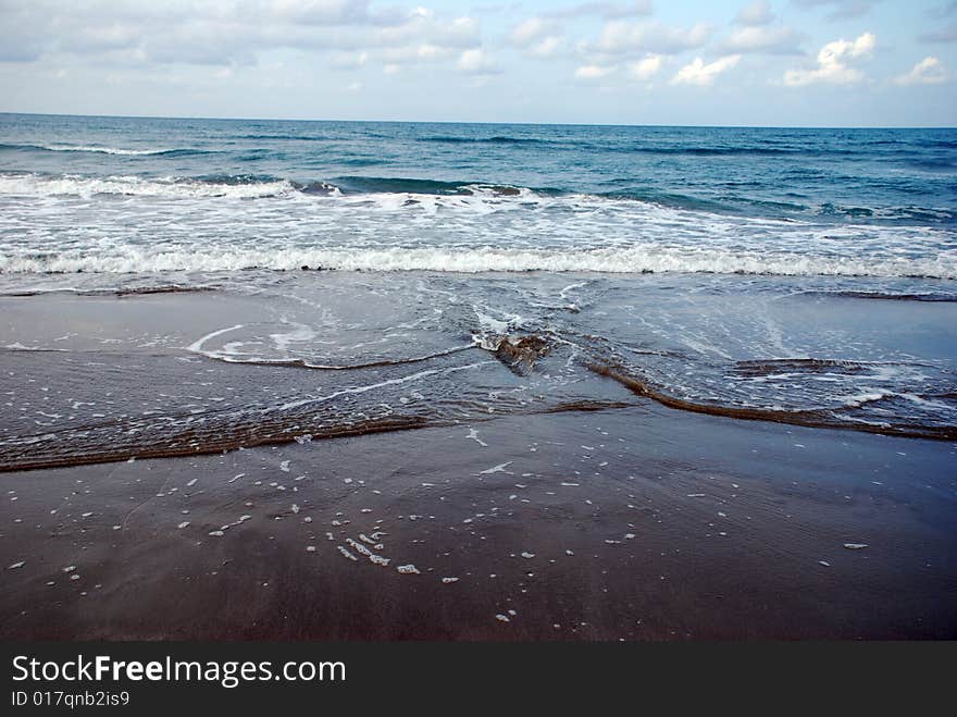 Waves breaking on the beach. Waves breaking on the beach