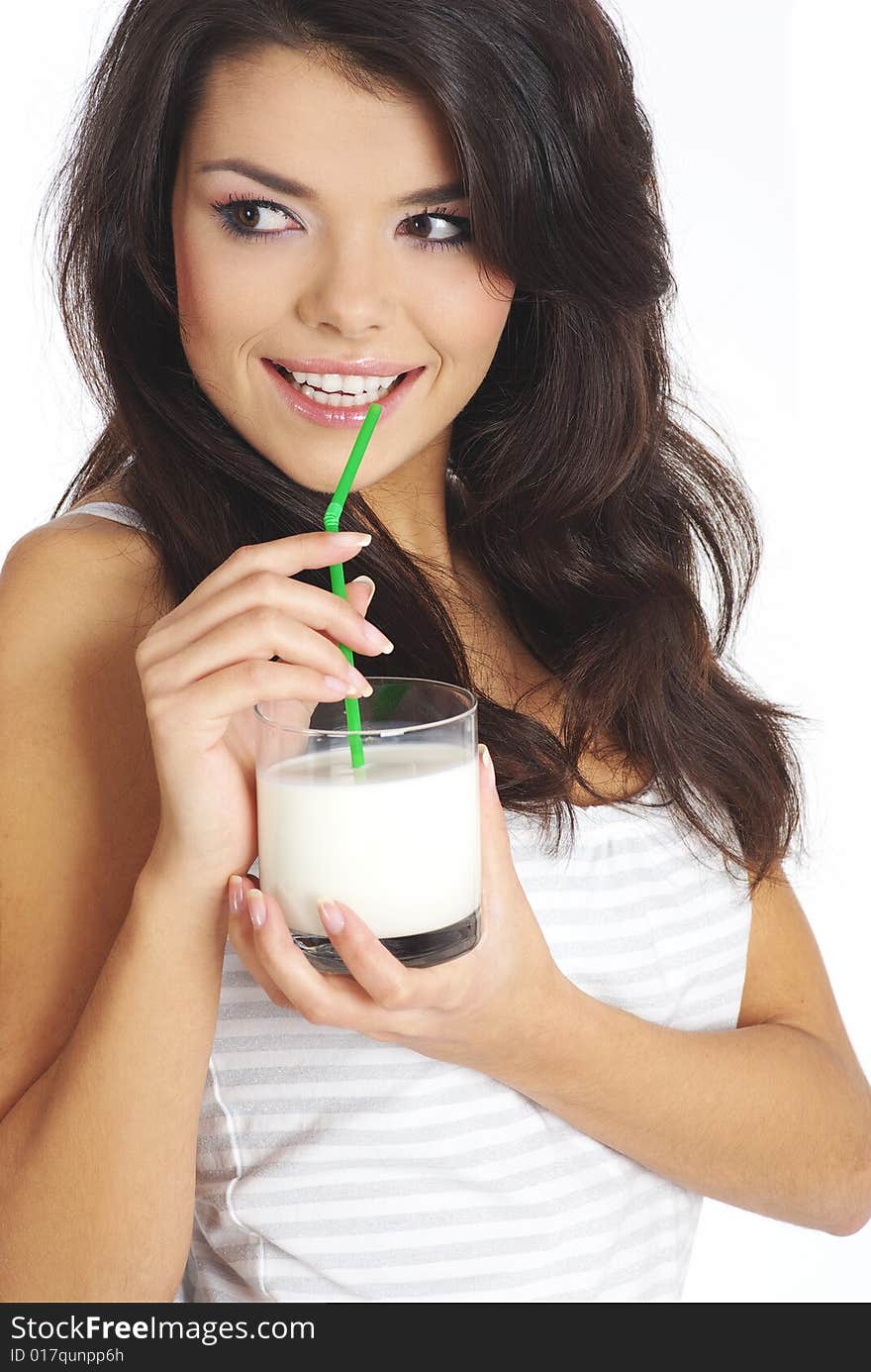 Happy woman drinking milk