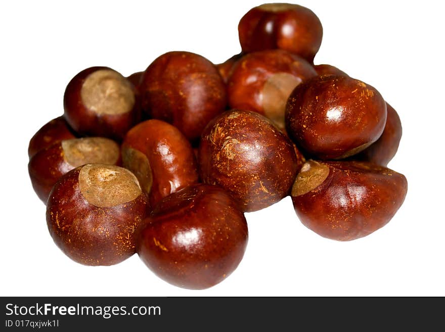 Composition of chestnuts isolated on white background