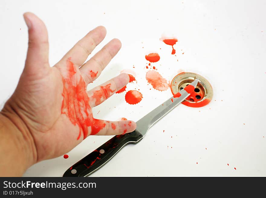 Bloodied Knife And Hand