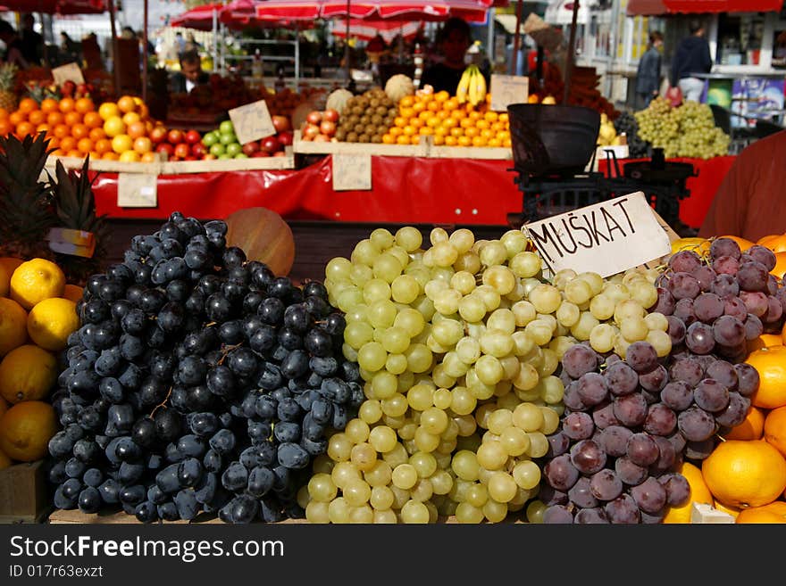 Display of fresh colourful grapes on market in Europe