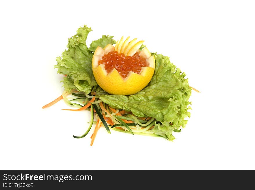 A lemon, a caviar of a salmon, a carrots and a cucumber are isolated on the white background. A lemon, a caviar of a salmon, a carrots and a cucumber are isolated on the white background.