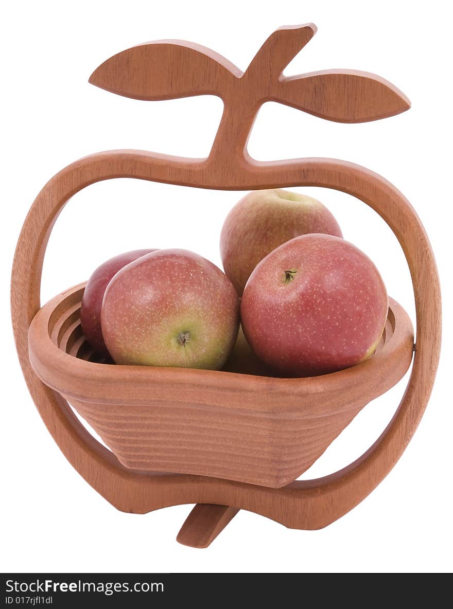 Apple shaped wooden bowl full of apples