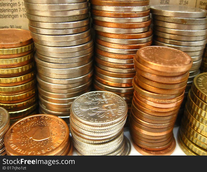 Stacks of different coins from Europe and Canada. Stacks of different coins from Europe and Canada