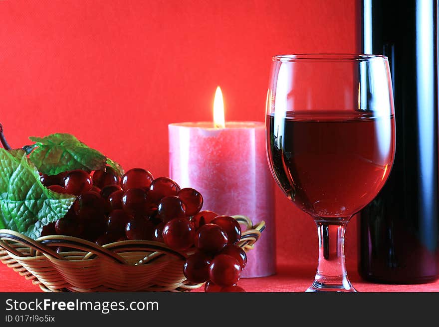 Red Wine with Wine Bottle on Table