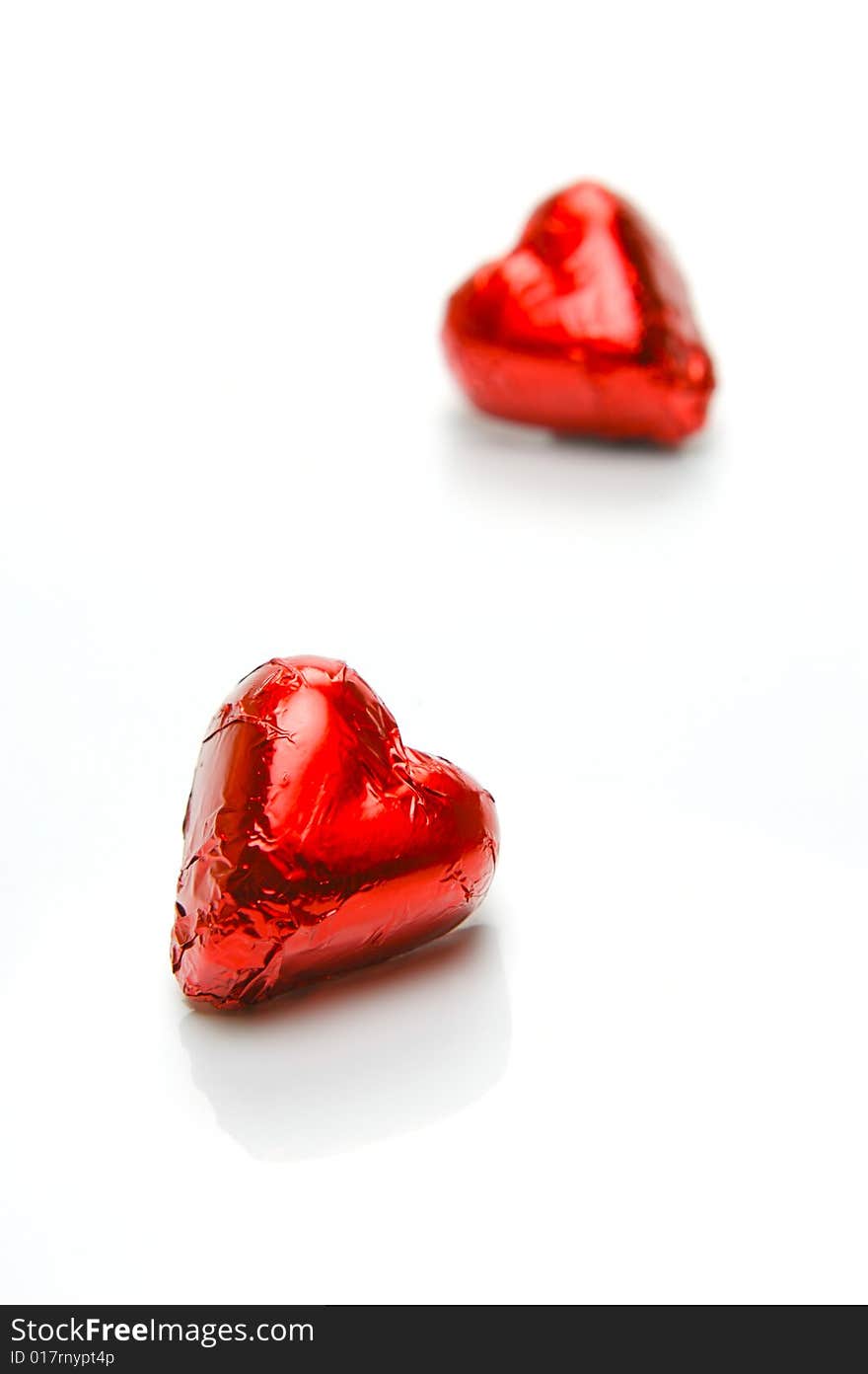 Chocolate love hearts isolated against a white background