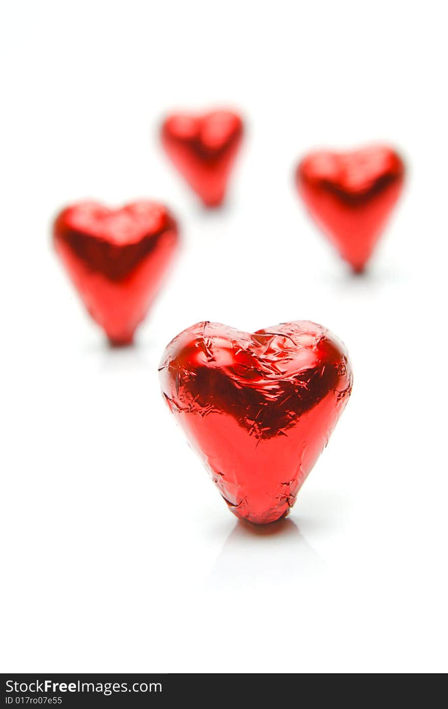 Chocolate love hearts isolated against a white background