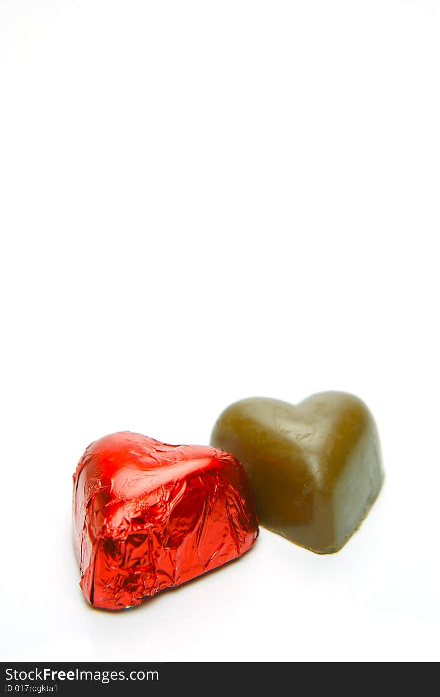 Chocolate love hearts isolated against a white background