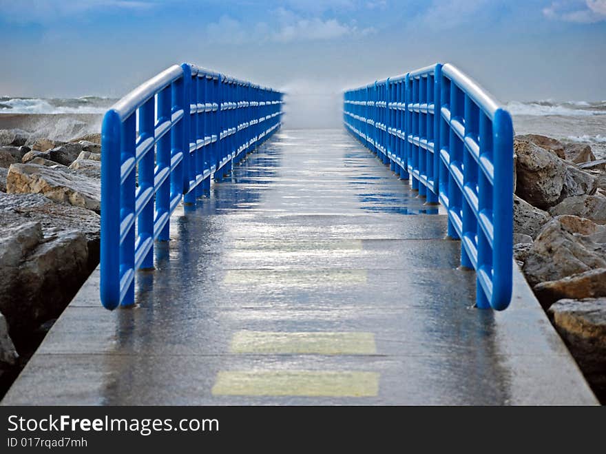 Wild waves wetting the pier. Wild waves wetting the pier.