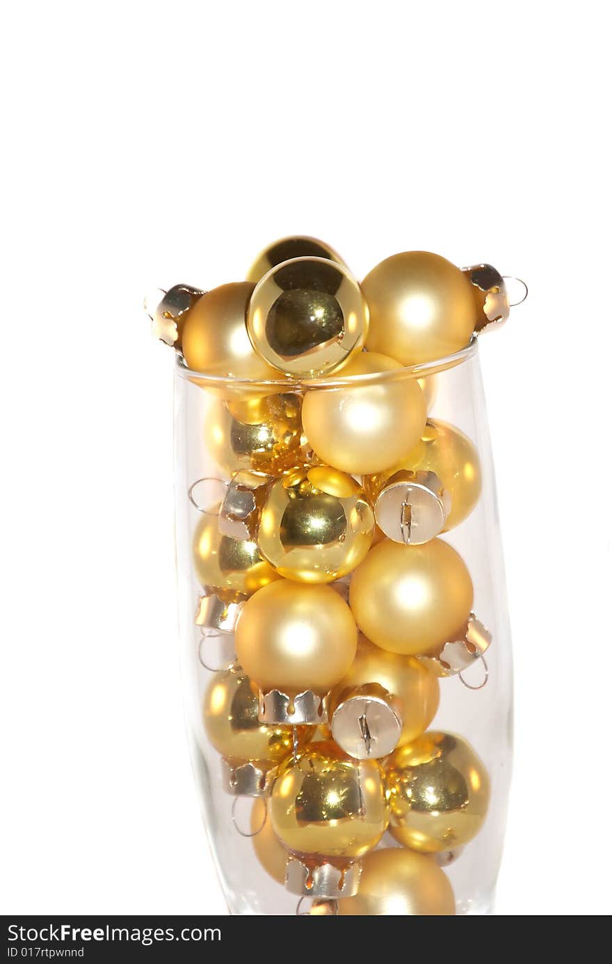 Christmas gold ornaments imitated glass with champagne. Christmas gold ornaments imitated glass with champagne.