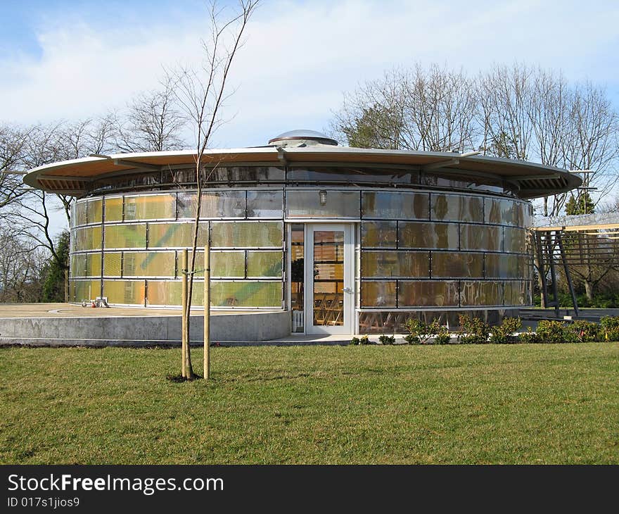 Modern round building in a park