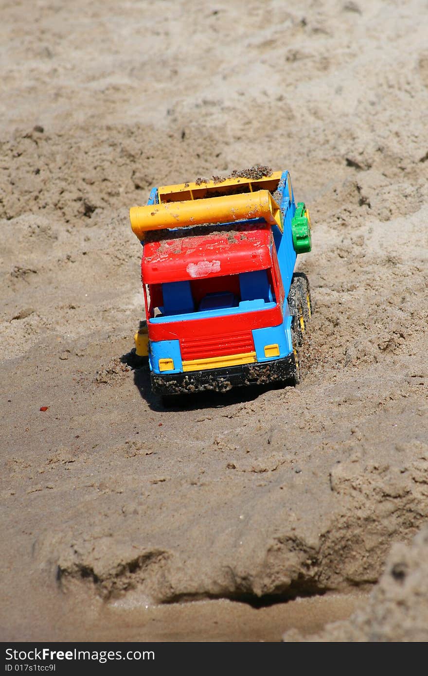 Car in the beach sand