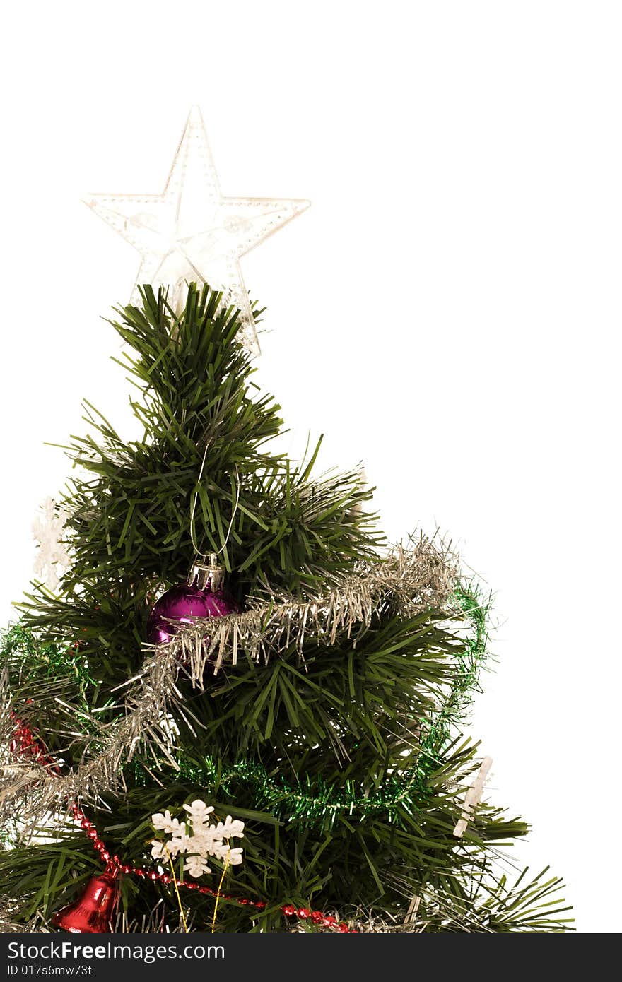 Christmas tree with a star on top against a white background. Christmas tree with a star on top against a white background