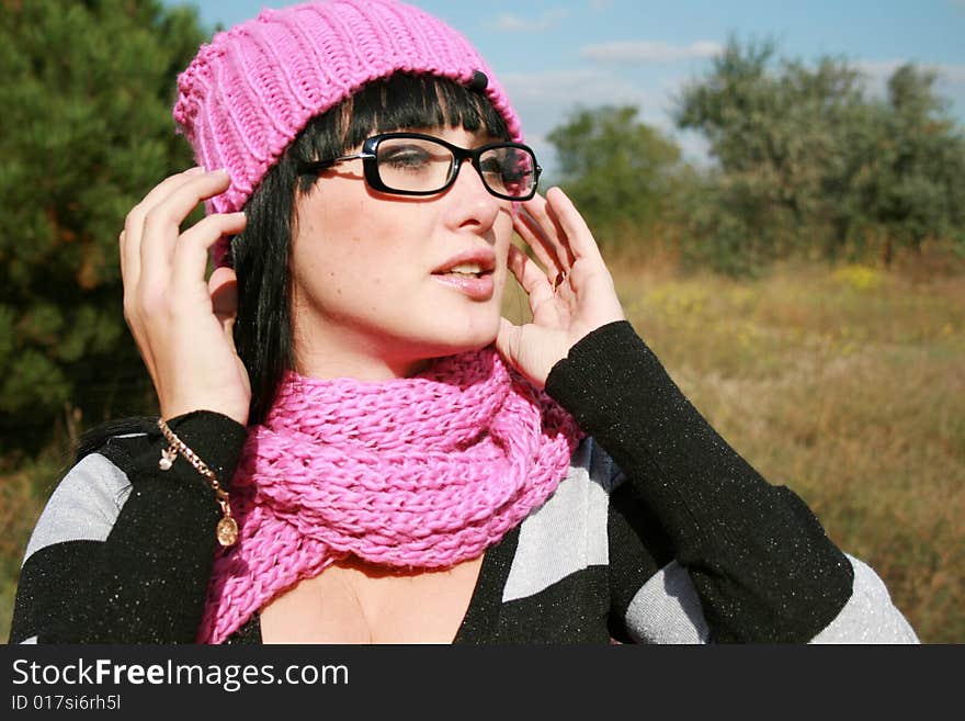 Young beautiful woman in a red cap