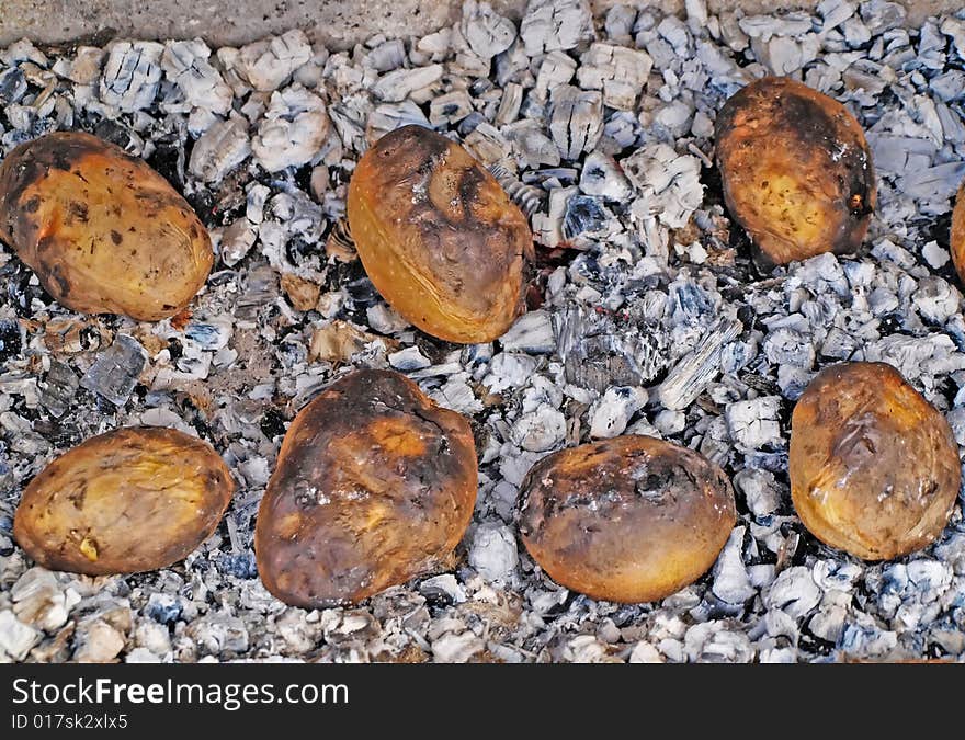 Potato on coals.